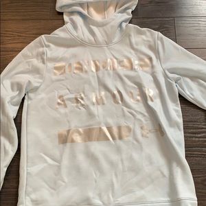 Light blue under armour pullover hoodie.